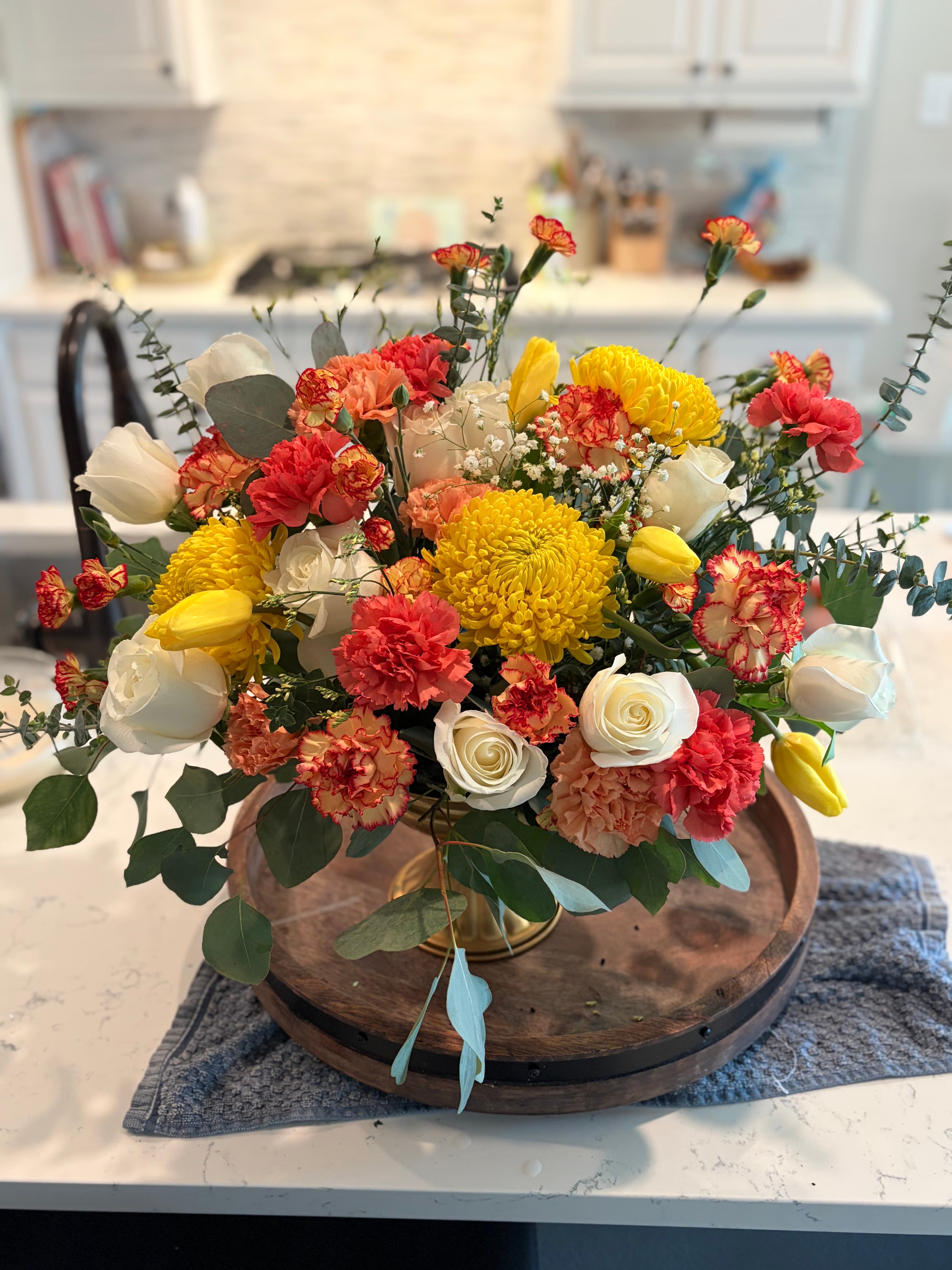 Fresh floral arrangement by Wild Bloom